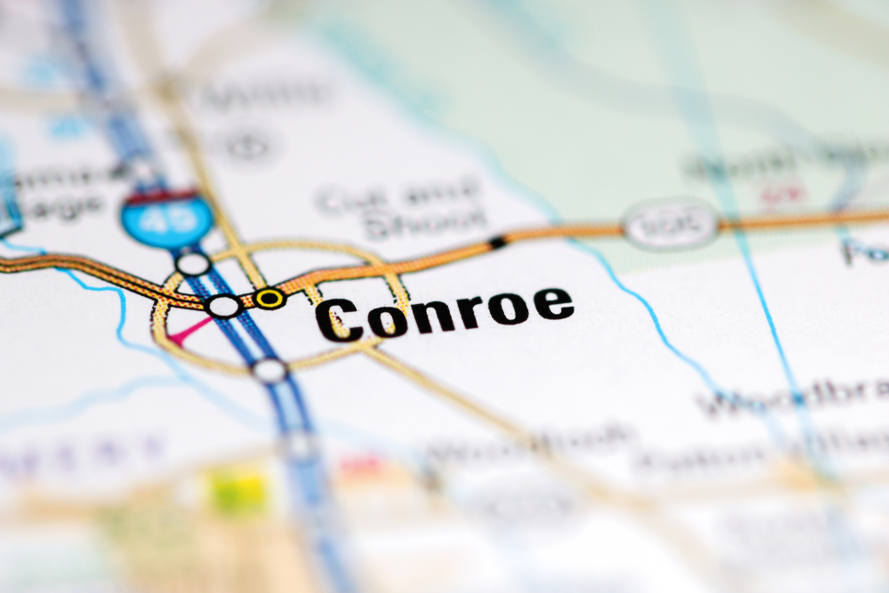 Words Conroe printed on a map