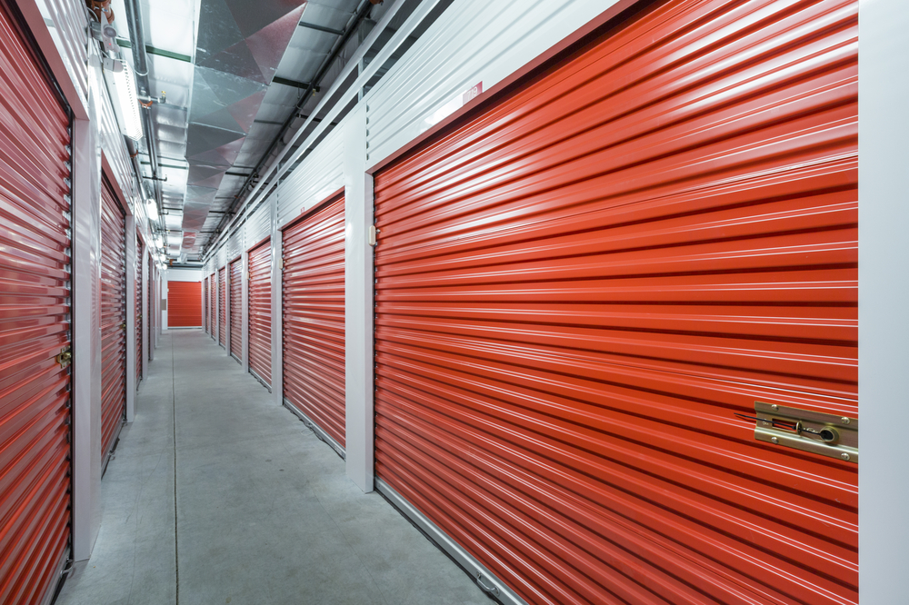 hall of red doored storage units
